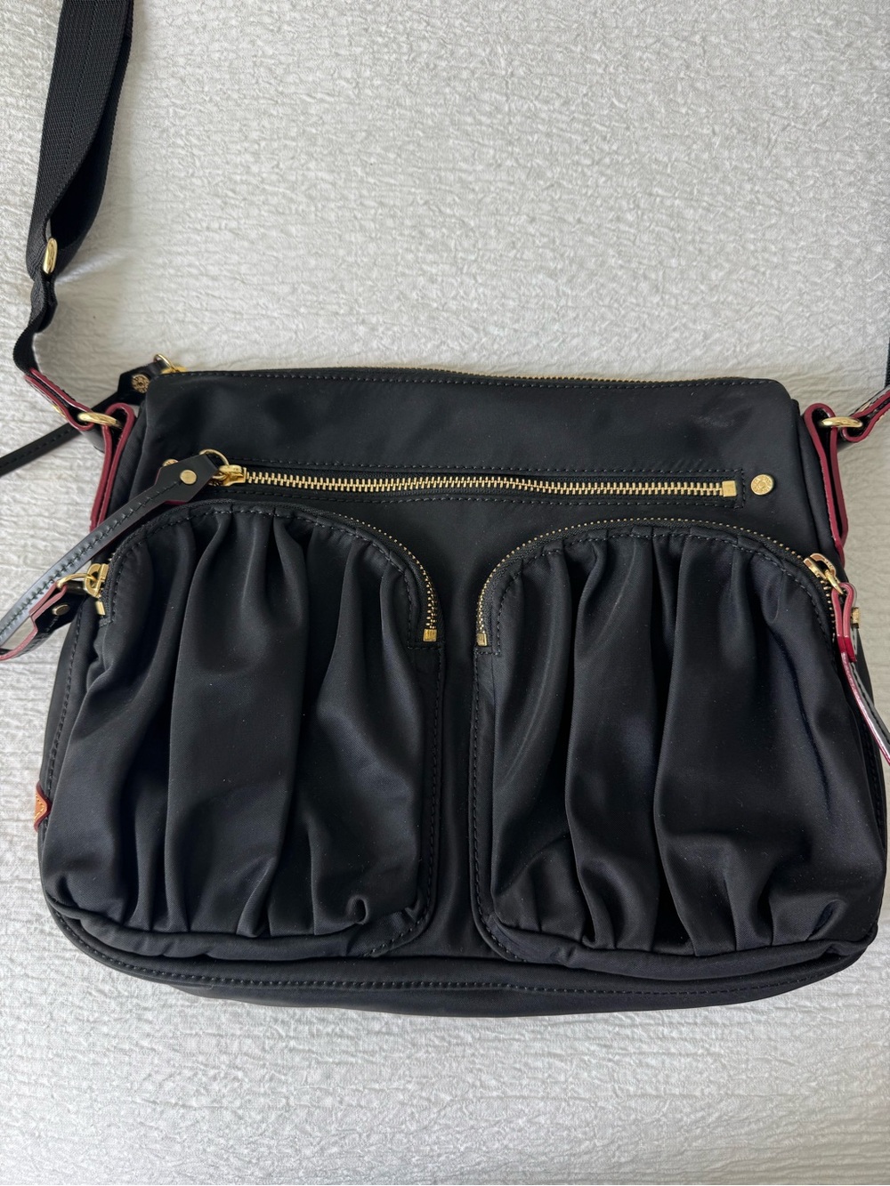 MZ Wallace Paige Black Nylon Crossbody with Gold Hardware and Detachable Pouch.